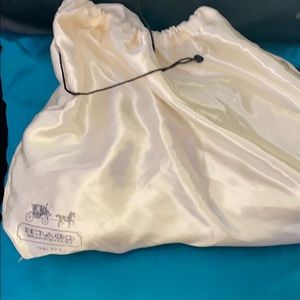 Ivory coach purse in original silk bag